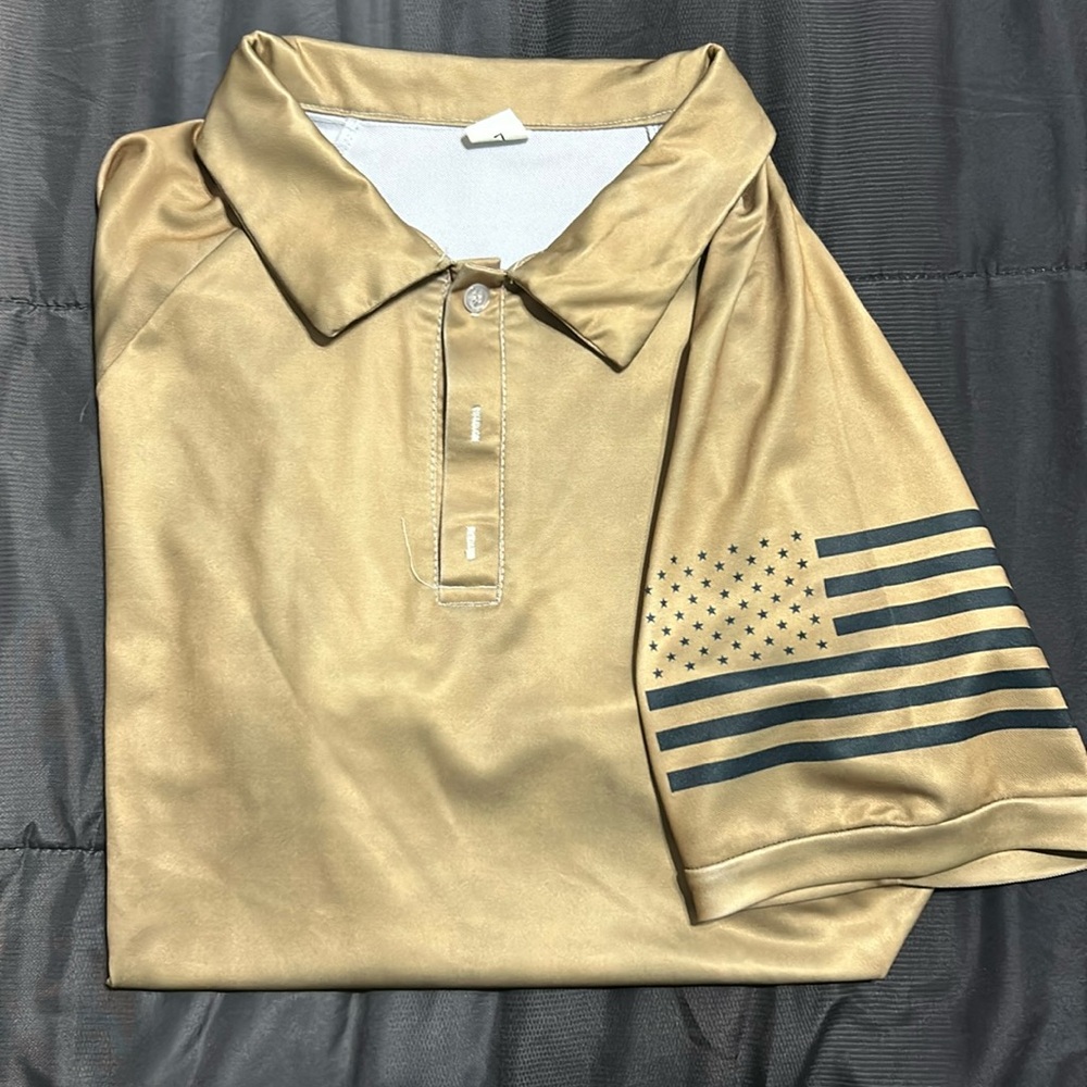 Men’s Large polo. Runs a little big.
